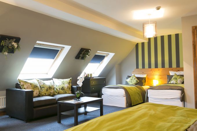 A spacious family suite in Camden Deluxe Hotel