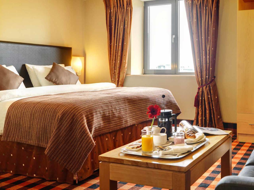 A warmly hospitable double bedroom in the Best Western Plus Academy Plaza Hotel, Dublin