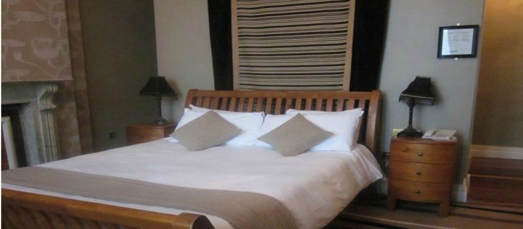 A comfy double bed in the Jackson Court Hotel