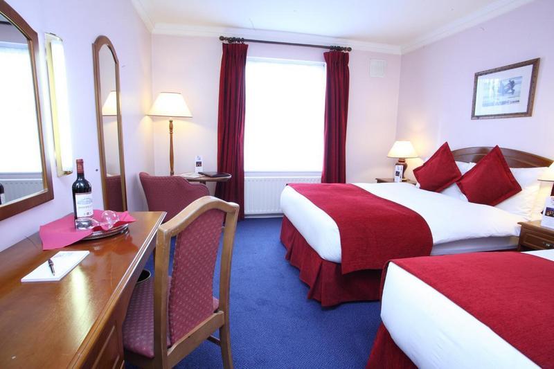 A spacious, comfortable family room in Charleville Lodge Hotel