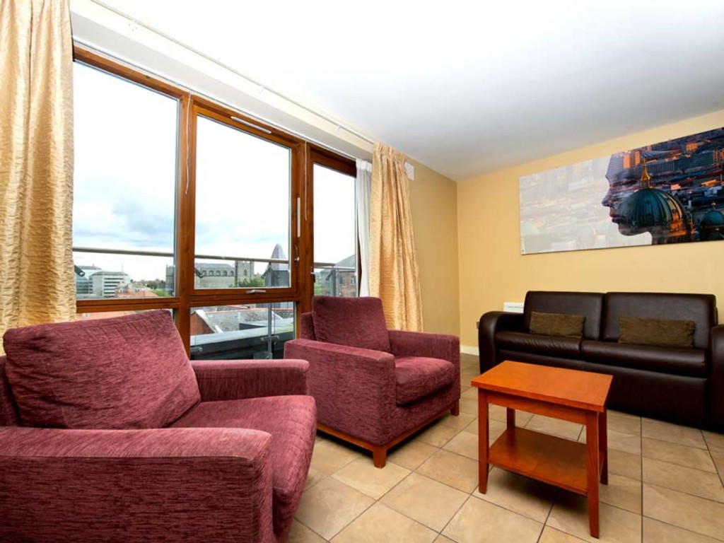 A spacious, comfy lounge with a view in Staycity Apartments, St. Augustine Street