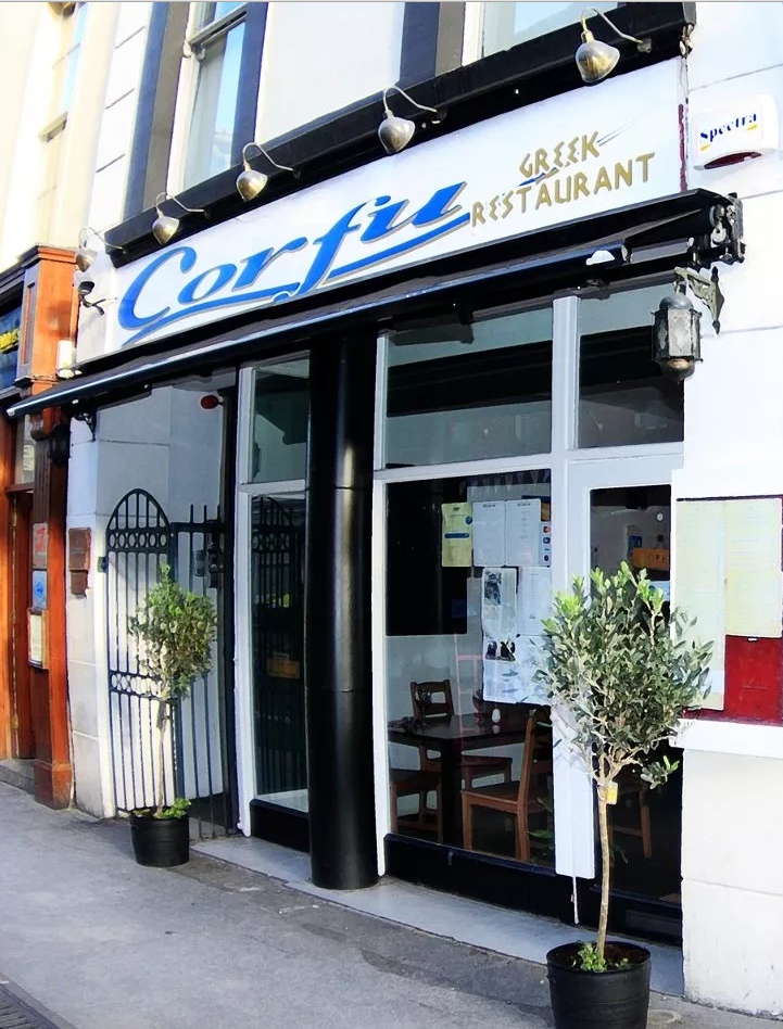 The front entrance and exterior of Corfu Greek Restaurant
