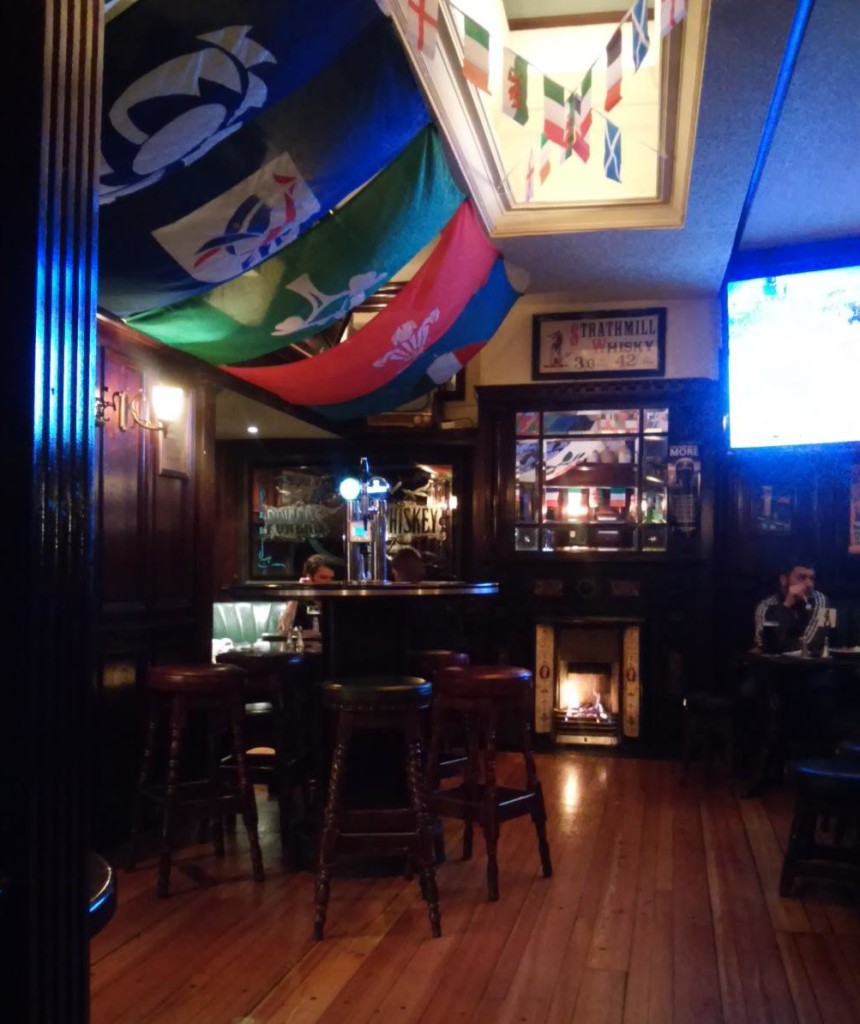 The colourful dining area and warm fireplace of O'Neill's Bar and Restaurant, Dublin