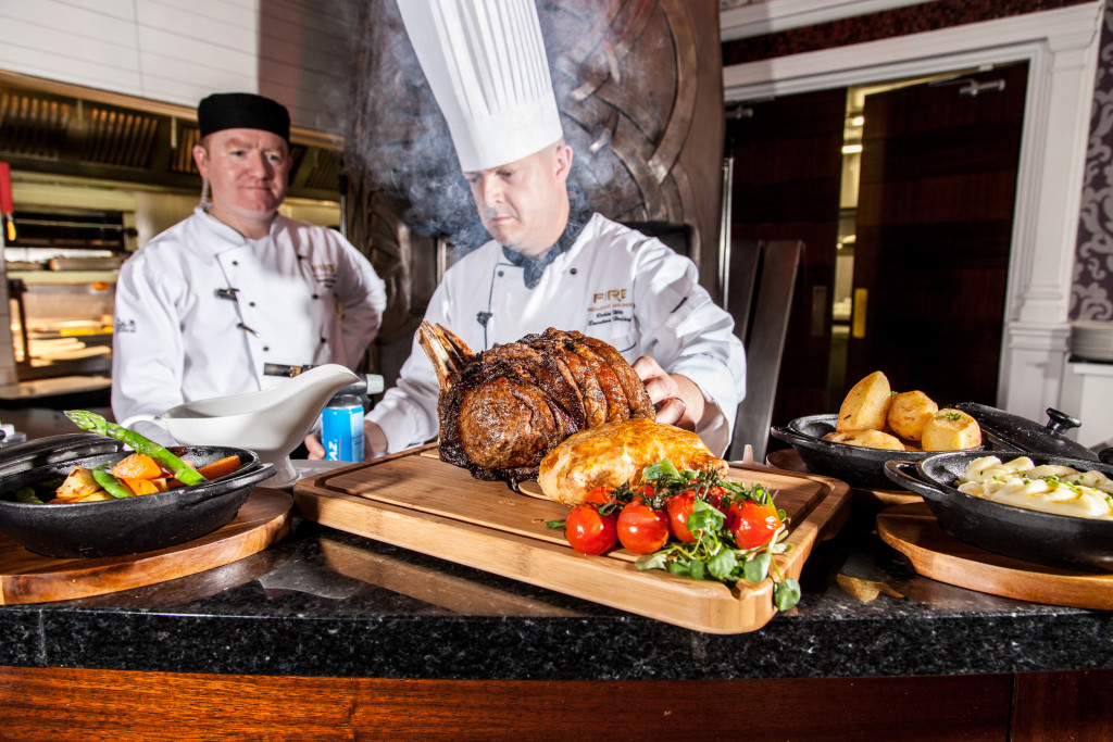Fire Restaurant's chefs, with examples of meat and vegetable cuisine