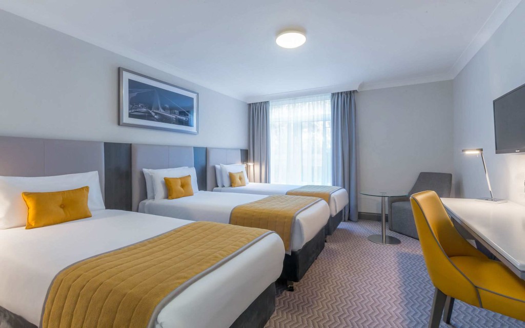 A spacious, modern triple bedroom in Maldron Hotel, Dublin Airport