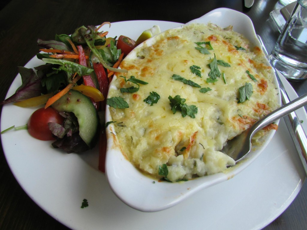A bowl of shepherds pie with crisp country vegetables in Farm Restaurants