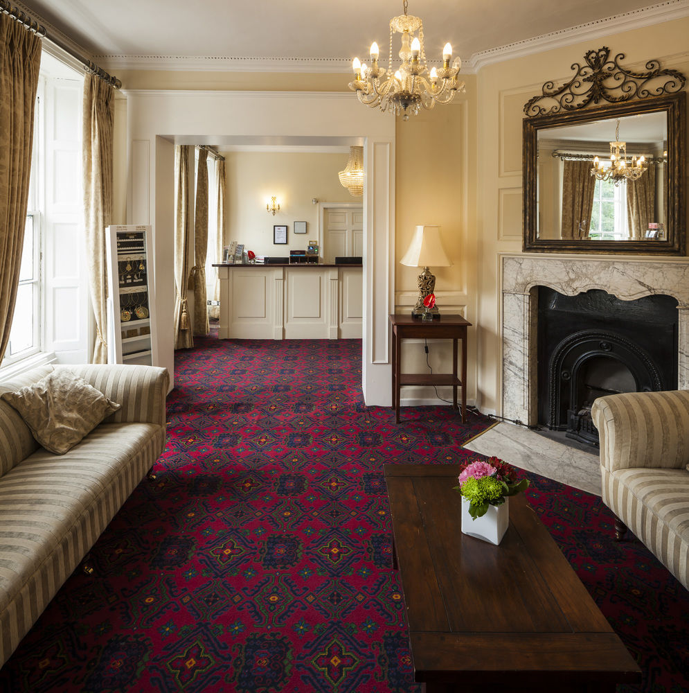 The smart, comfy sitting room and reception of Staunton's on the Green