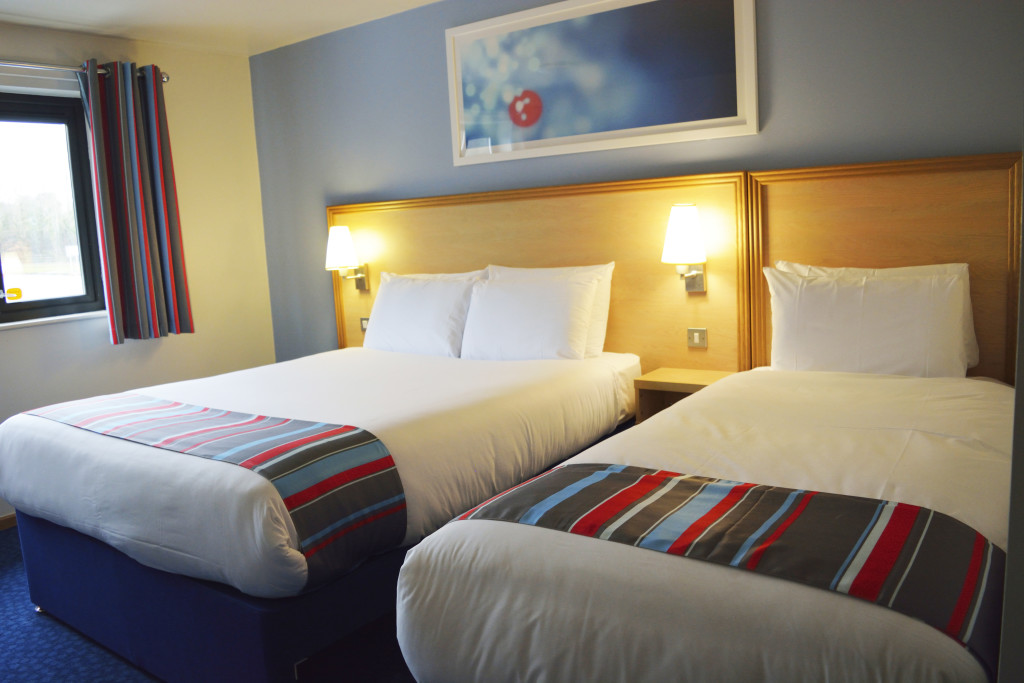A spacious, warmly lit triple room in Travelodge Dublin Airport North 'Swords' Hotel