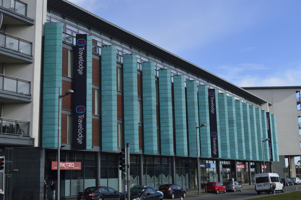 The large, distinct exterior of Travelodge Dublin Airport South Hotel