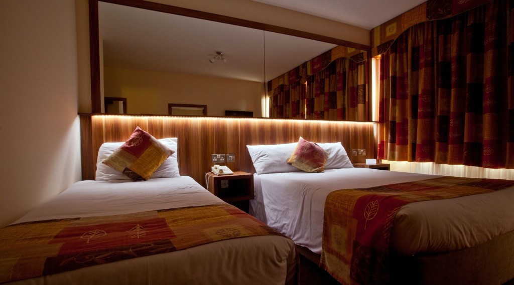 An ambient, peaceful triple bedroom in West County Hotel