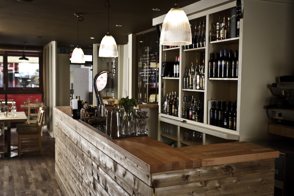 The modern interior bar with wood and wine emphasis in Whitefriar Grill